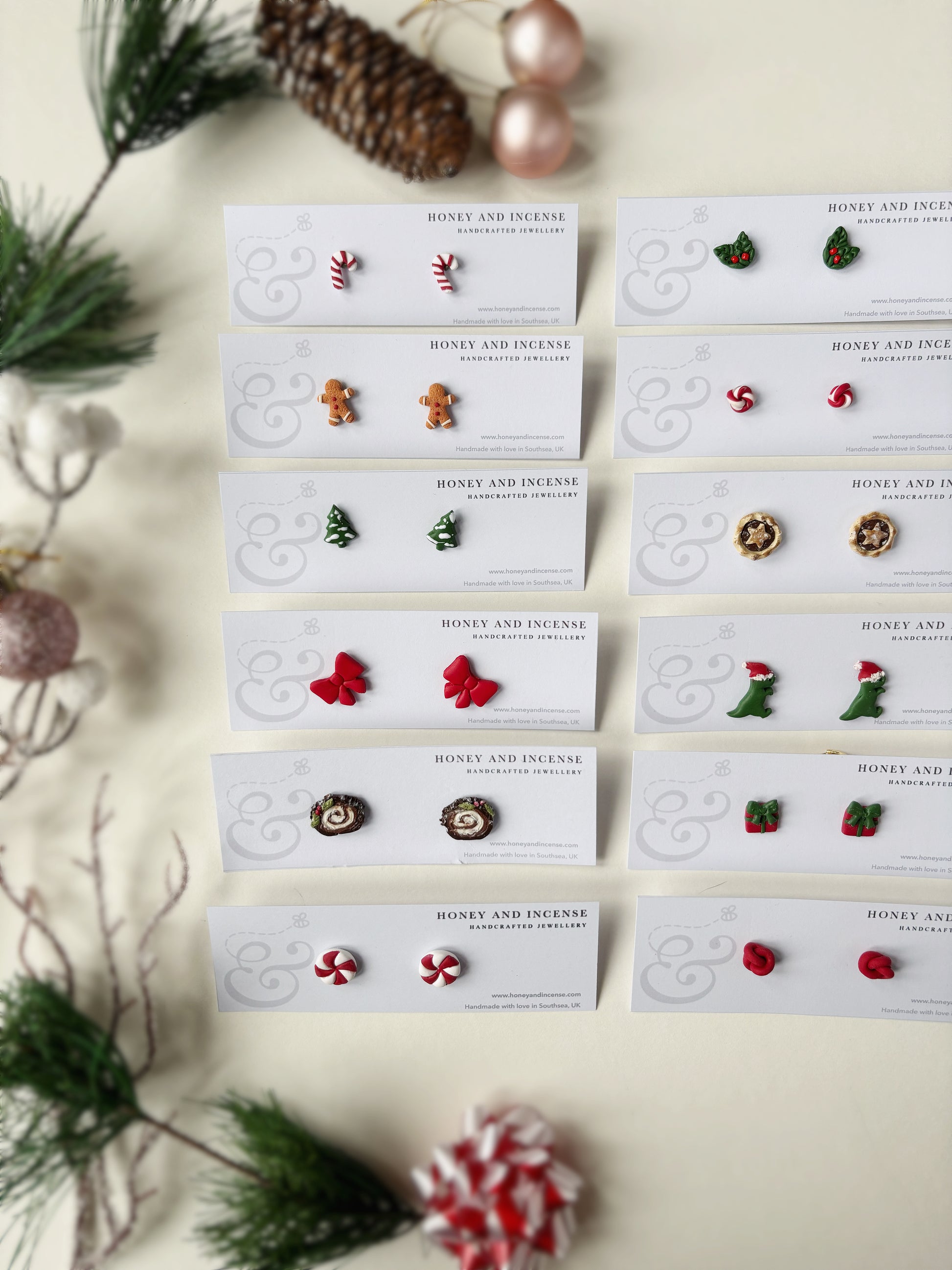 A selection of 12 different pairs of polymer clay Christmas stud earrings