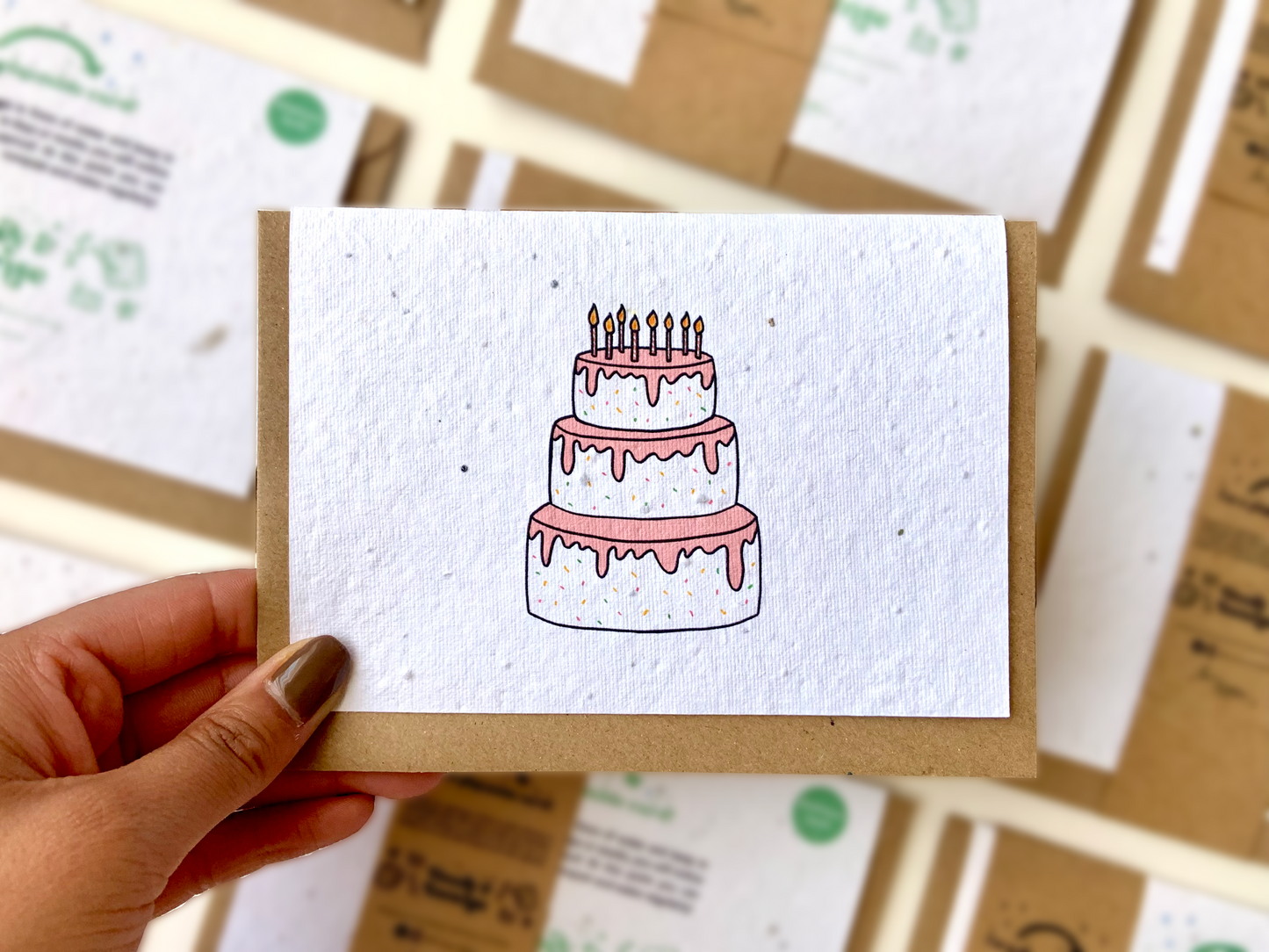 Big pink cake greetings card on plantable wildflower seed paper