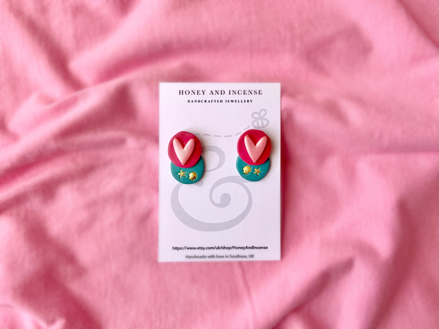 hot pink and turquoise layered earrings with hearts and seashells 