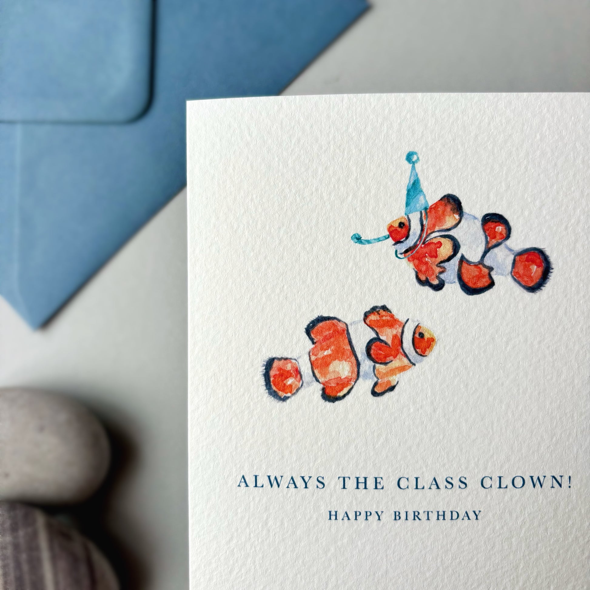 Birthday card with clownfish illustration and text 'Always the class clown! Happy Birthday' on a white background.