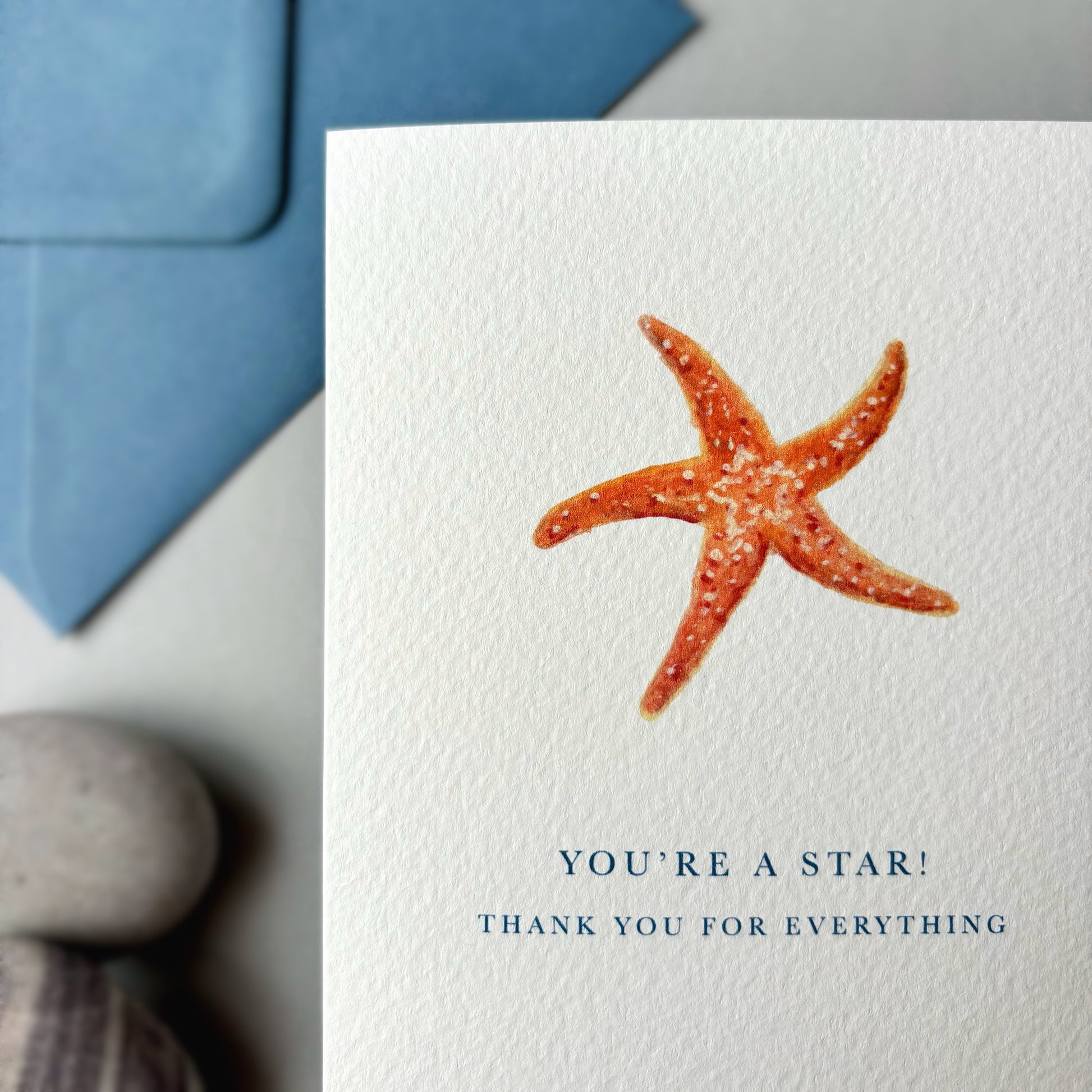 Card with a starfish illustration and text 'You're a star! Thank you for everything' on a white background.