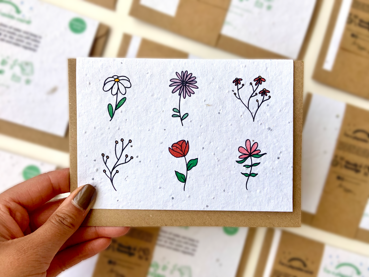 Illustrated flowers on a plantable seed wildflower greetings card